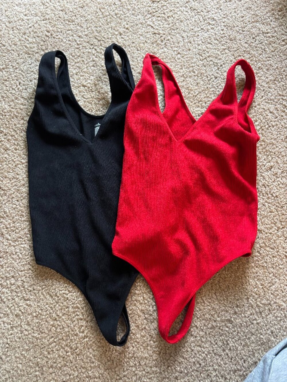 Set of 2 Colsie stretchy bodysuits red/black, size small/XS great condition